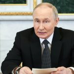 Путин